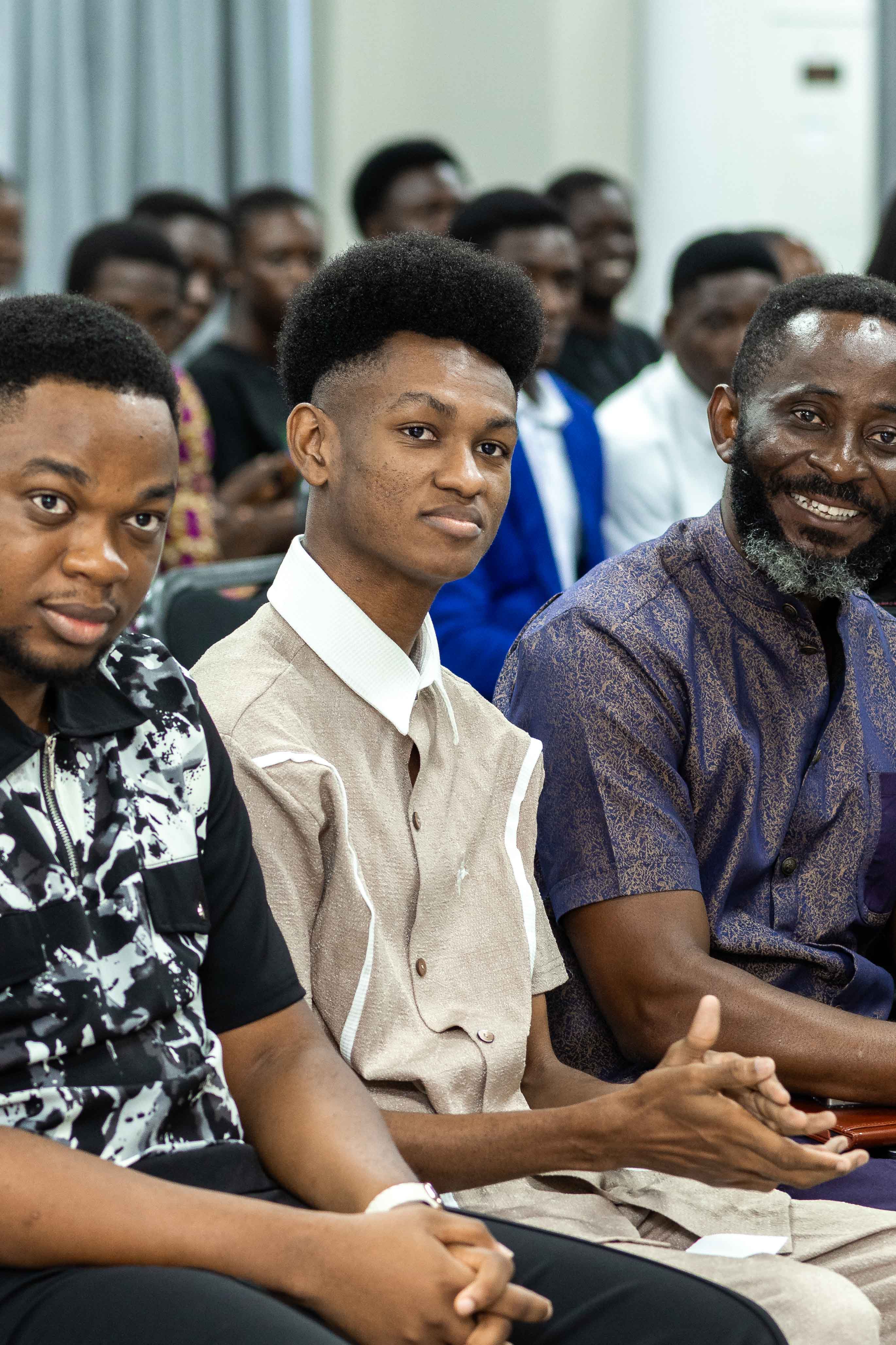 Delegates listening during a session