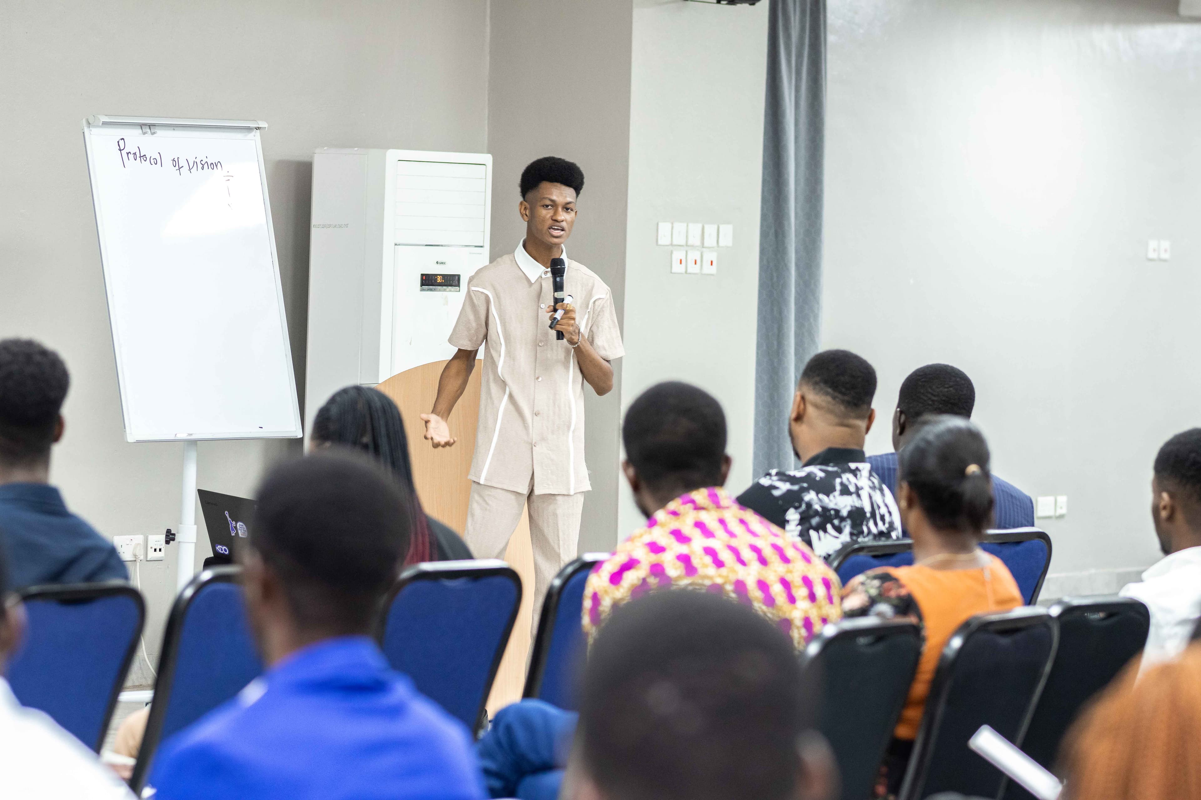 Samuel presenting at a flipchart